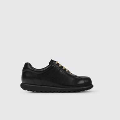 Side view of Pelotas Iconic black shoe for women