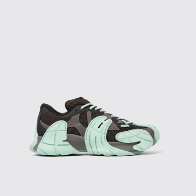 Side view of Tormenta Gray and light green sneakers