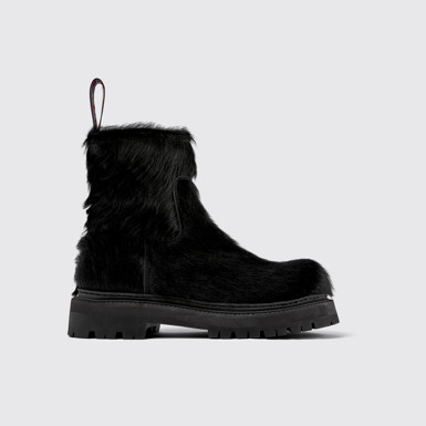 Side view of Eki Black long calf hair boots