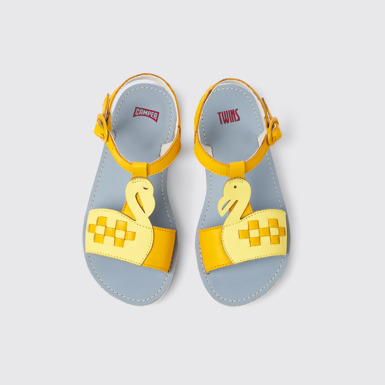 Overhead view of Twins Yellow and orange leather sandals for kids