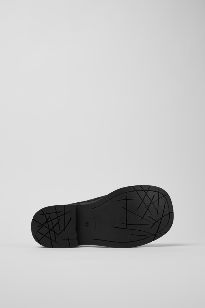 The soles of MIL 1978 Black leather ballerinas