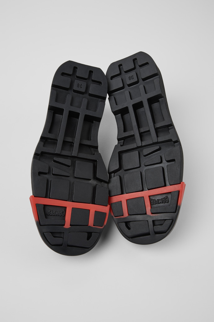 The soles of Junction Black Leather Women's Shoe.